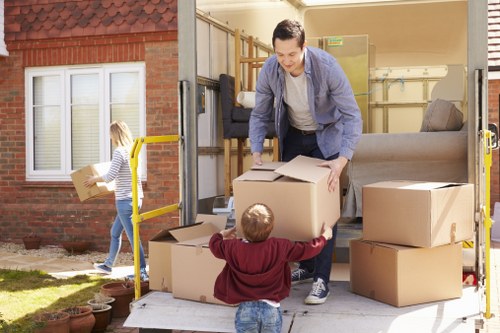 Moving van and packed boxes for removals in Brimsdown