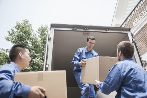 Packed boxes and personal items ready for student storage in Brimsdown